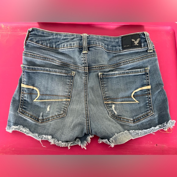 American Eagle distressed 4”denim short, more distressed on front, some on back. - Picture 2 of 6